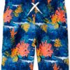 Traje de baño tipo bermuda para niño con estampado de tiburones y arrecifes disponible en Rosy Badia.