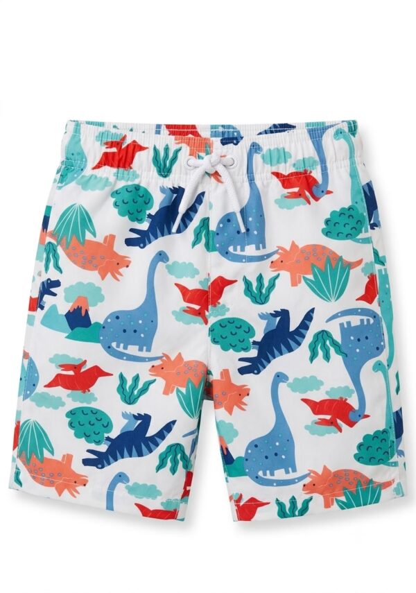 Set de traje de baño infantil con camiseta UV de dinosaurios y bermuda estampada con protección solar UPF 50+ disponible en Rosy Badia.