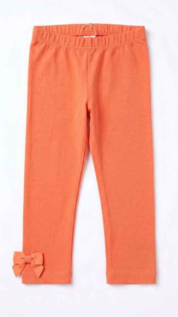 leggings capri infantil coral con lazo decorativo