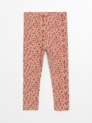 leggings coral con estampado floral para niña