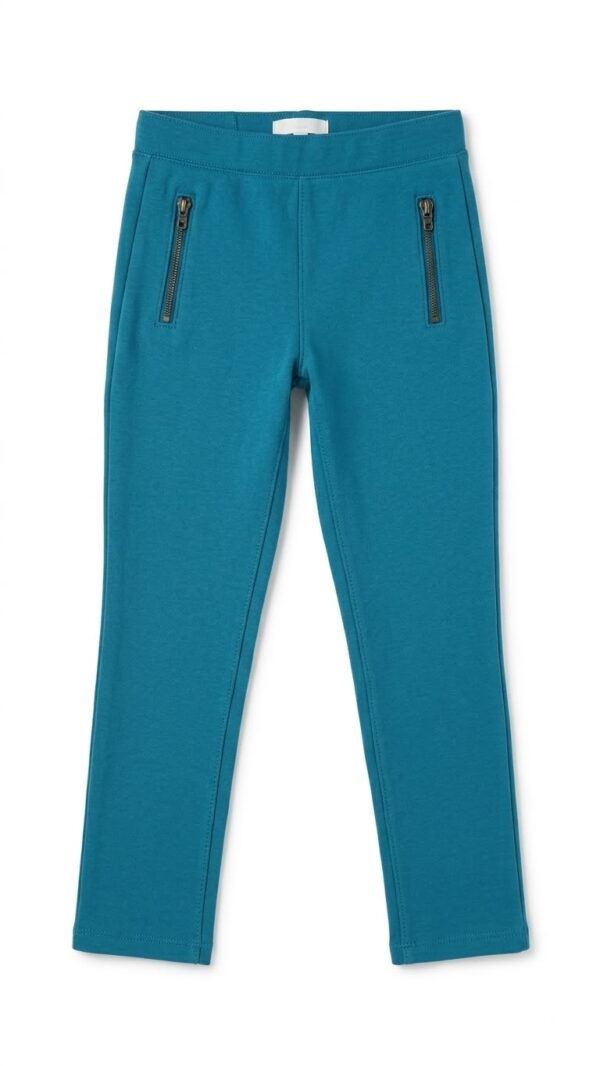 pantalón turquesa con bolsillos de zíper para niña