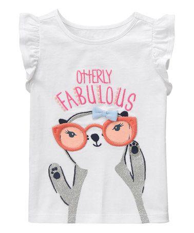 camiseta blanca de niña con nutria y volantes