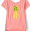 camiseta rosa con piña de lentejuelas para niña