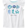 camiseta blanca para niña con animales marinos bordados